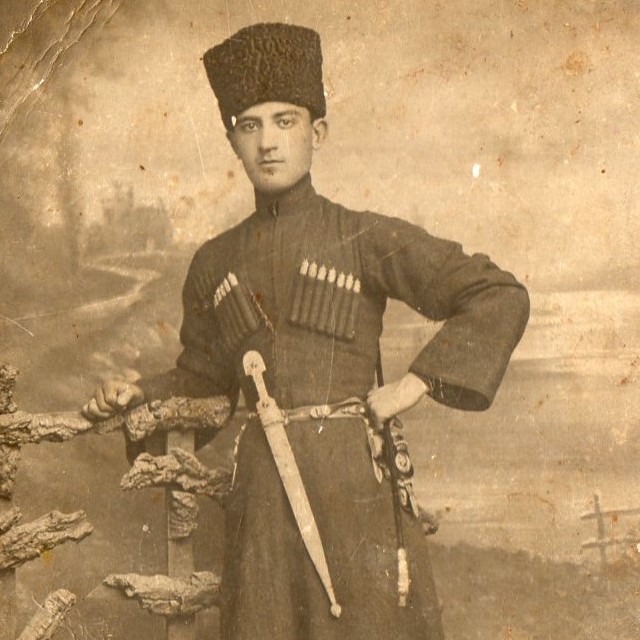 Photo of a young man in a Circassian with a dagger, Nalchik