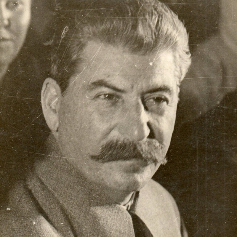 A large portrait photo of I.V. Stalin